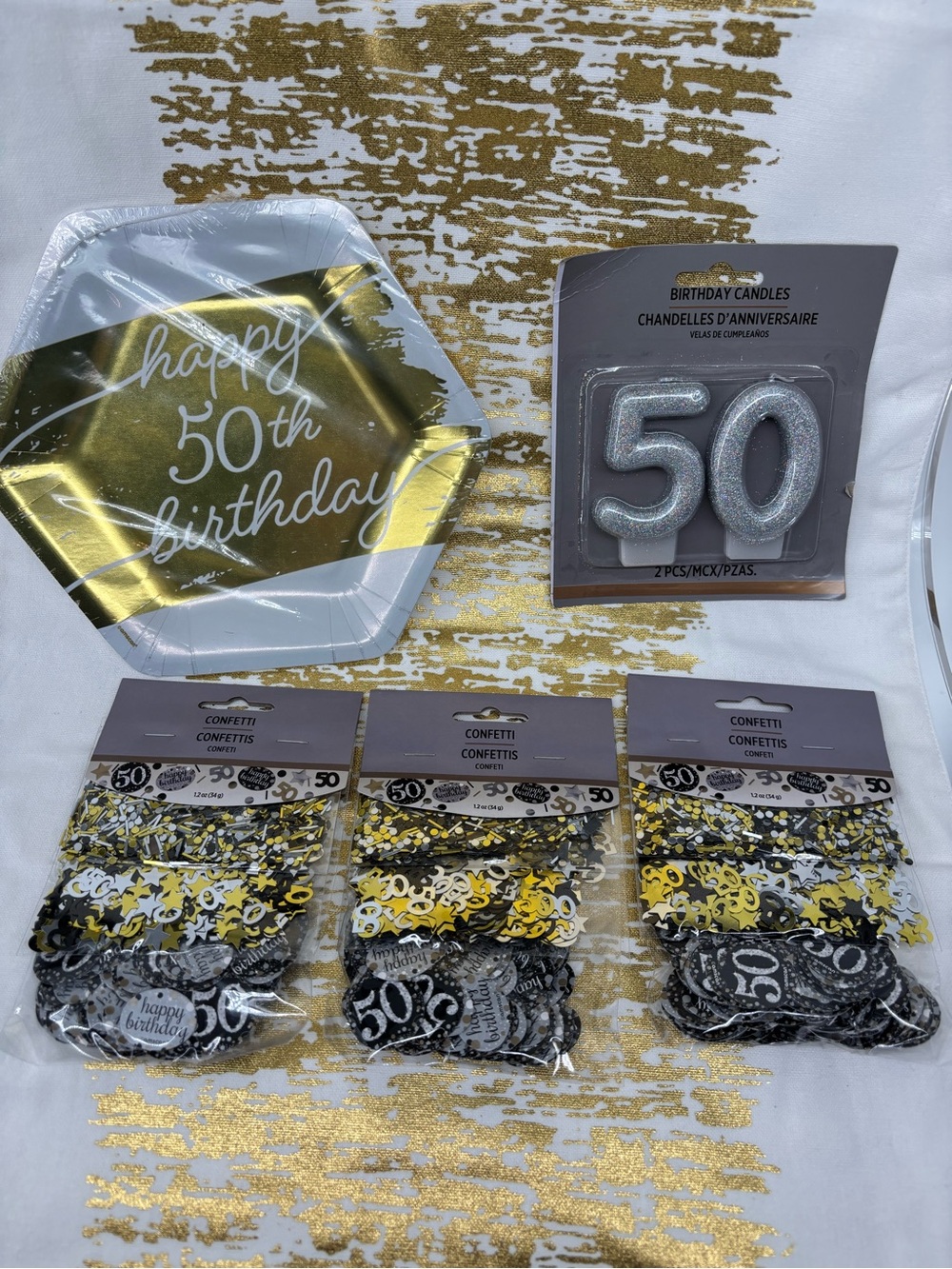 NWT 40 plates, 3 confetti sets, 1 candle 50th birthday kit